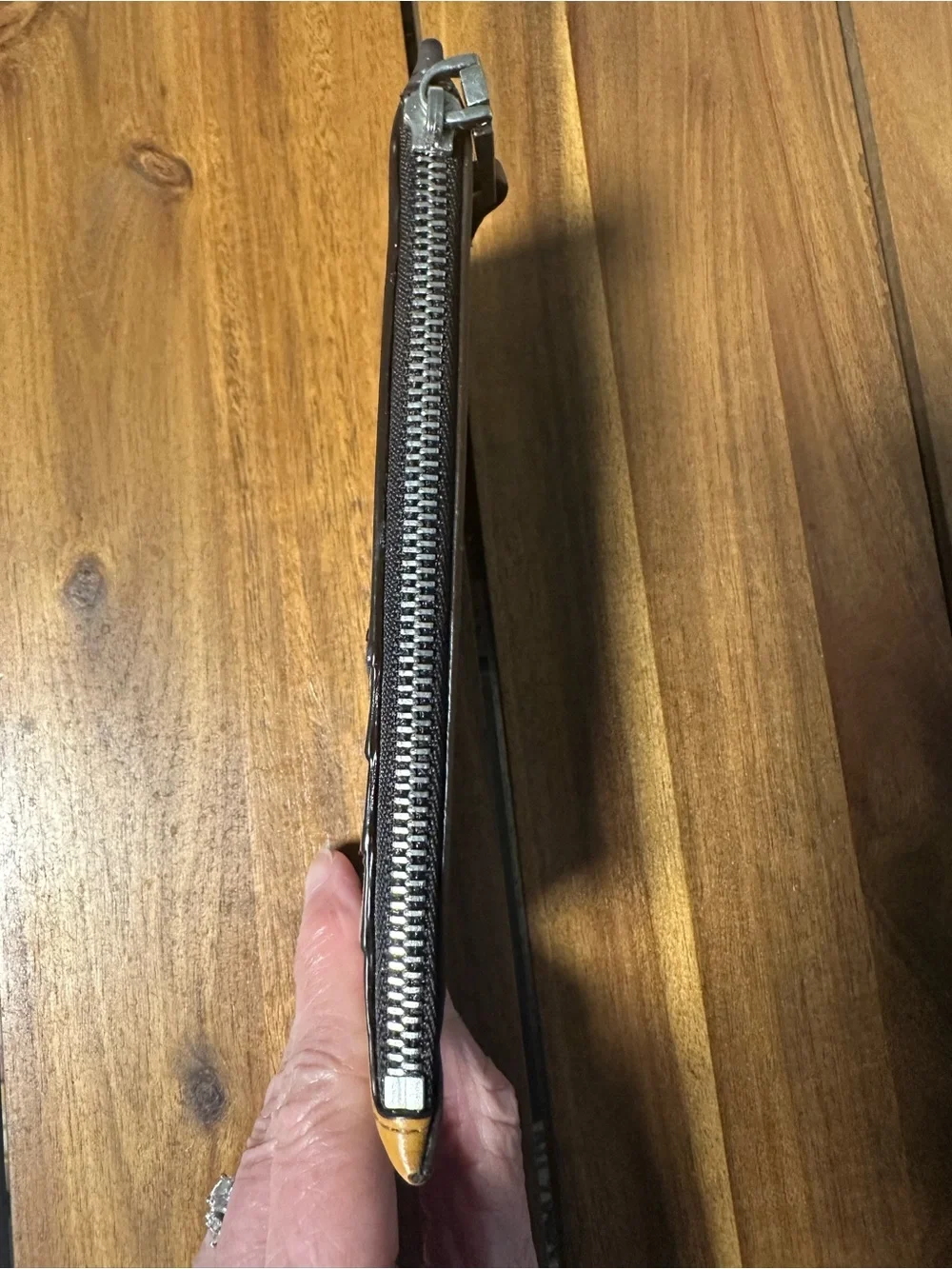 Coach slim zip